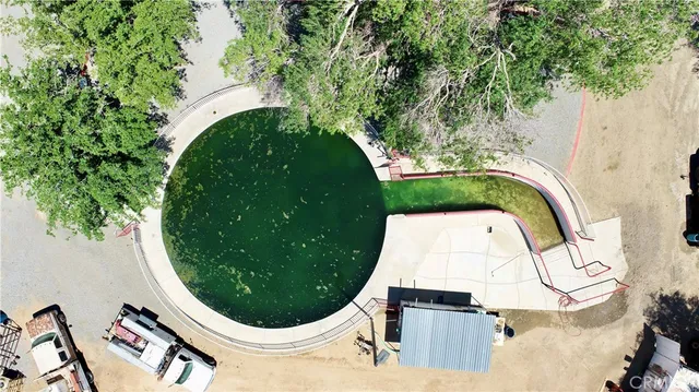 an aerial view of a swimming pool