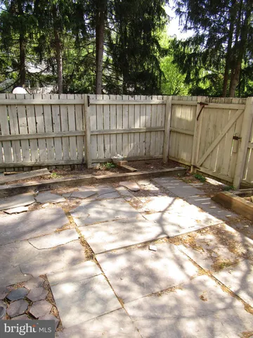 a view of a wooden fence