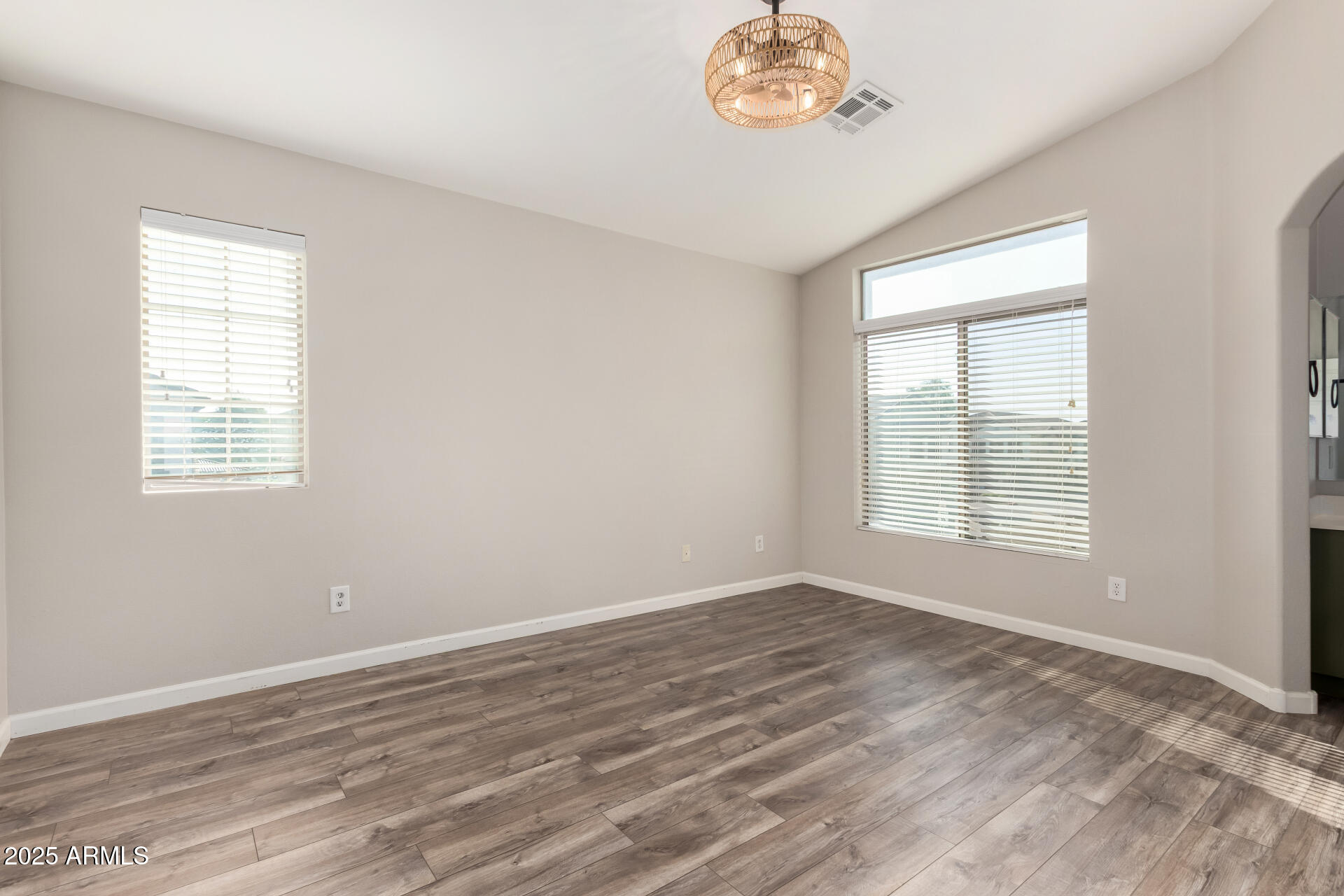 2725 East Mine Creek Road, Unit 1010 Phoenix, AZ 85024 - Photo 13 of 35 a view of an empty room with a window