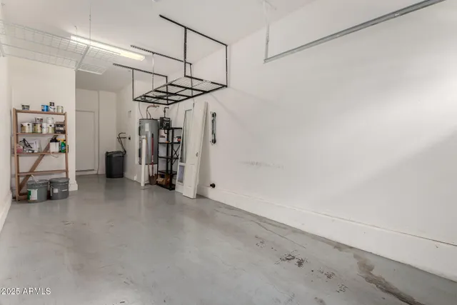 a view of a storage & utility room with stairs