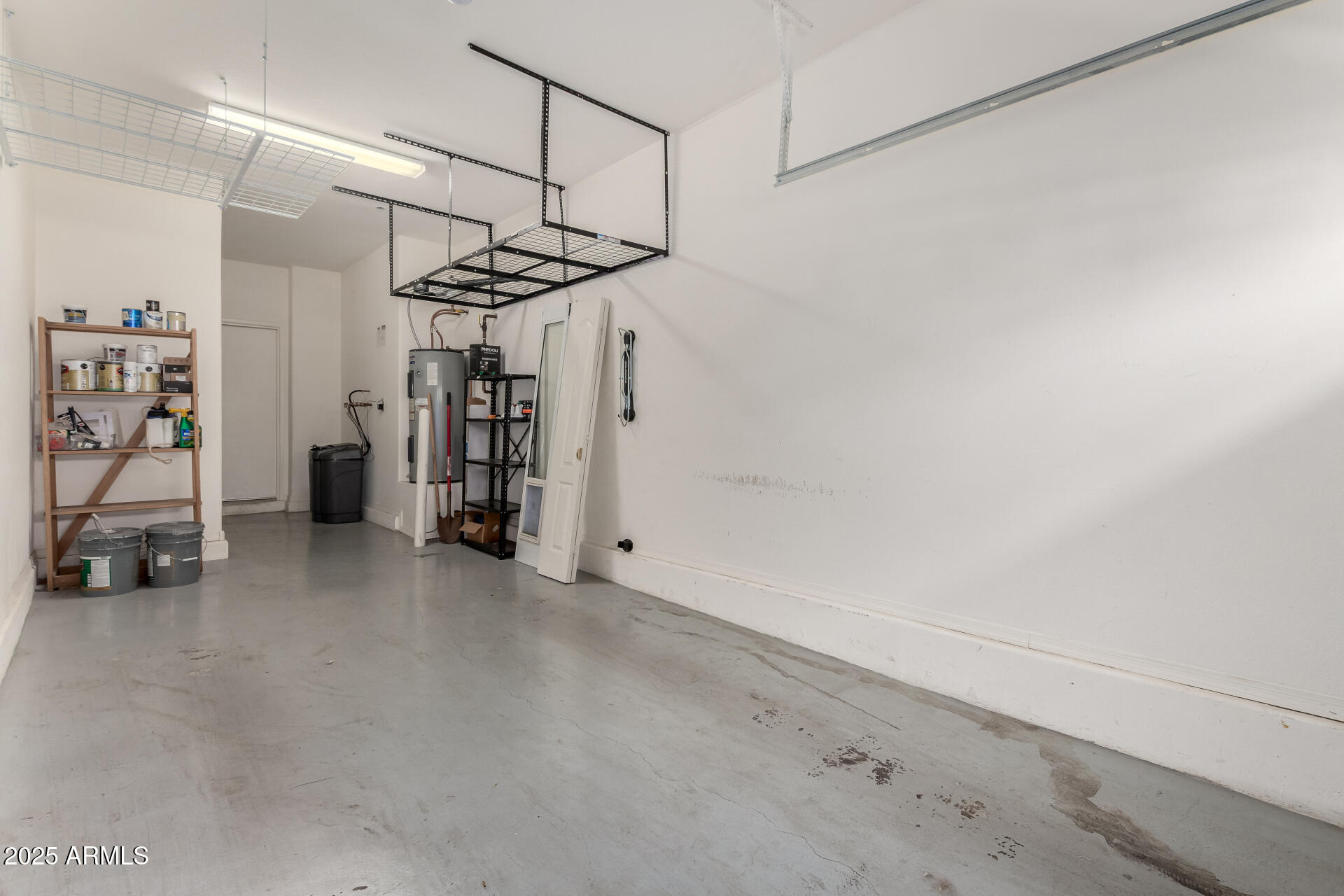 2725 East Mine Creek Road, Unit 1010 Phoenix, AZ 85024 - Photo 22 of 35 a view of a storage & utility room with stairs