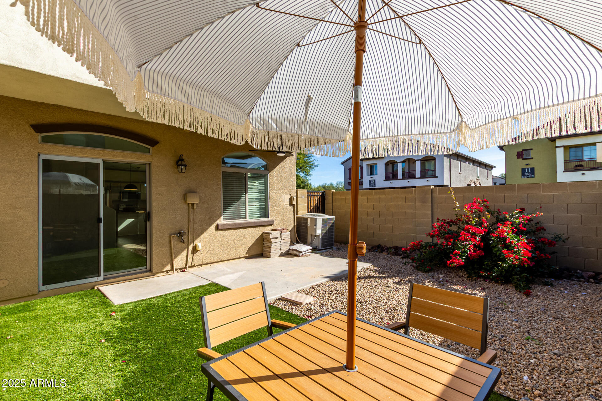 2725 East Mine Creek Road, Unit 1010 Phoenix, AZ 85024 - Photo 24 of 35 a view of outdoor space yard and porch