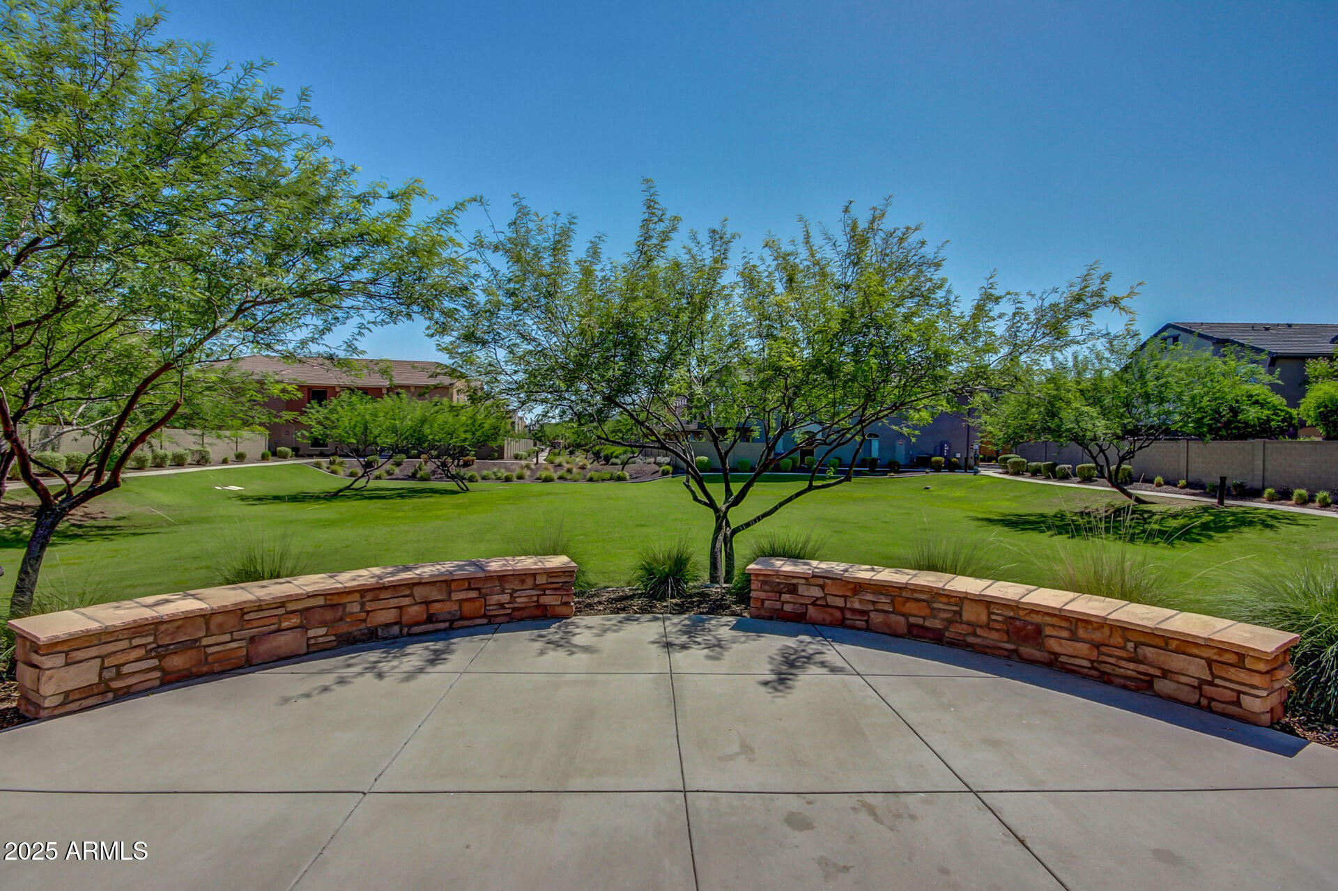 2725 East Mine Creek Road, Unit 1010 Phoenix, AZ 85024 - Photo 31 of 35 a view of yard with swimming pool and green space