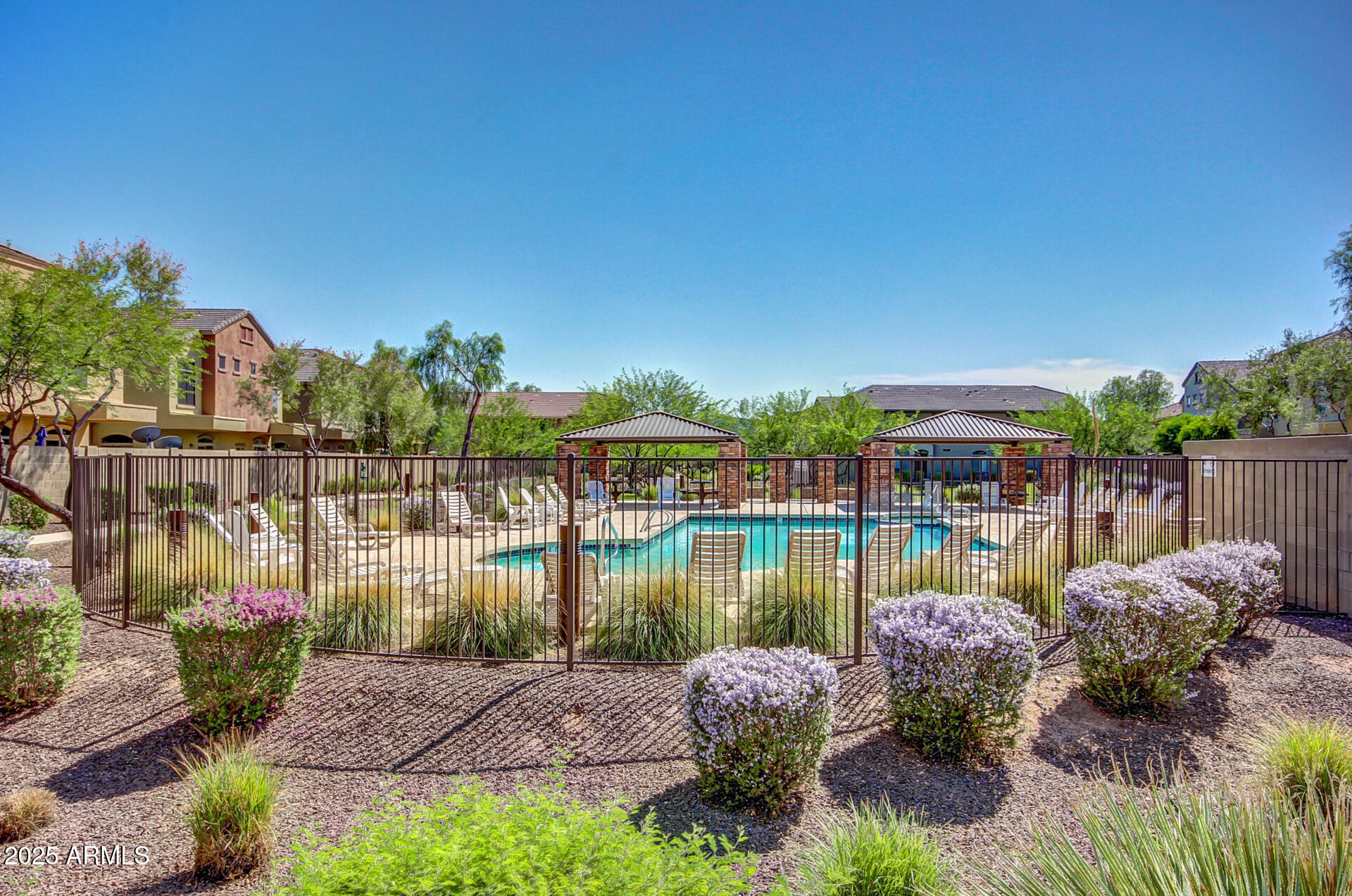 2725 East Mine Creek Road, Unit 1010 Phoenix, AZ 85024 - Photo 34 of 35 a garden view with a lake view