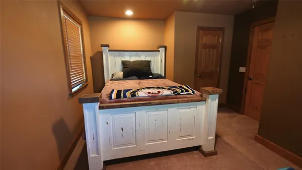 a view of washer and dryer with wooden floor