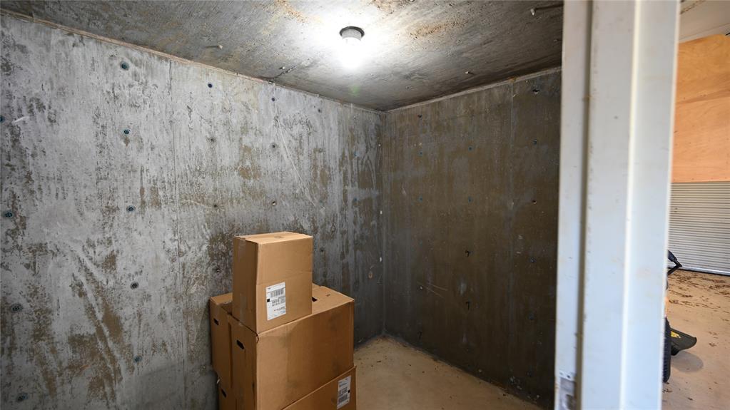 2377 Casino Road Nocona, TX 76255 - Photo 21 of 40 a room with a window and gate