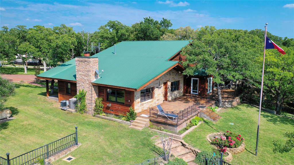 2377 Casino Road Nocona, TX 76255 - Photo 29 of 40 an aerial view of a house with swimming pool garden and patio