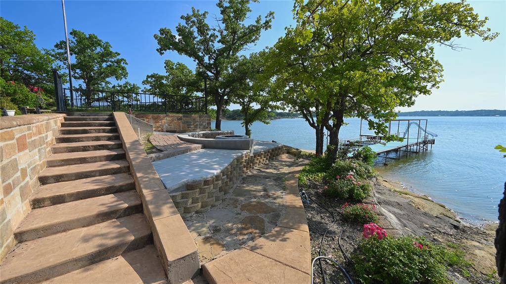 2377 Casino Road Nocona, TX 76255 - Photo 38 of 40 a view of a backyard with sitting area