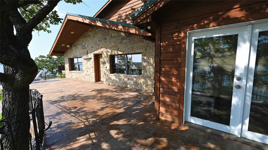 2377 Casino Road Nocona, TX 76255 - Photo 39 of 40 a view of a house with a yard