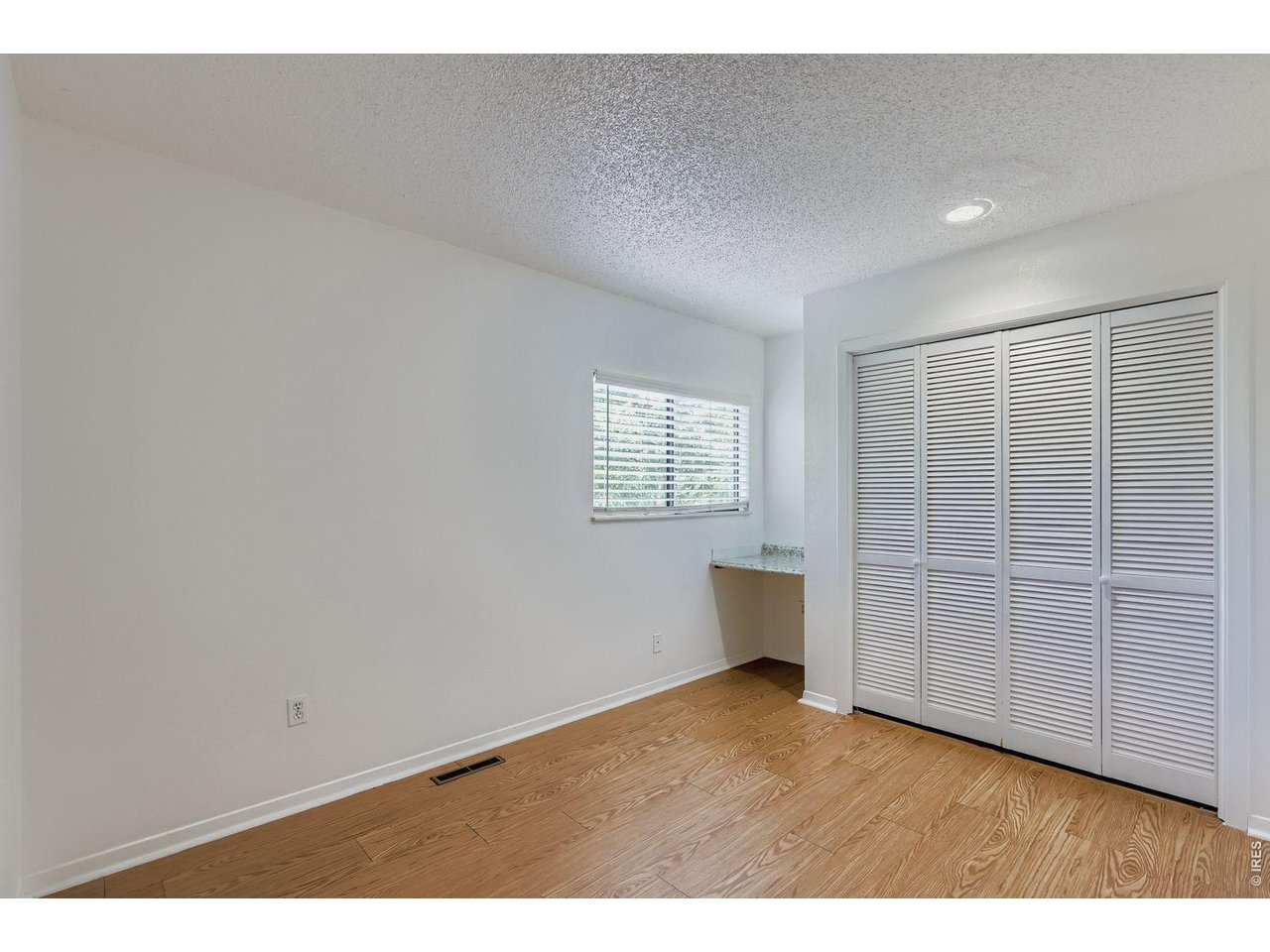 720 17th Street Boulder, CO 80302 - Photo 15 of 35 a view of an empty room with a window