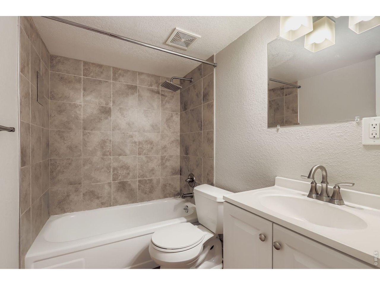 720 17th Street Boulder, CO 80302 - Photo 24 of 35 a bathroom with a sink toilet and shower