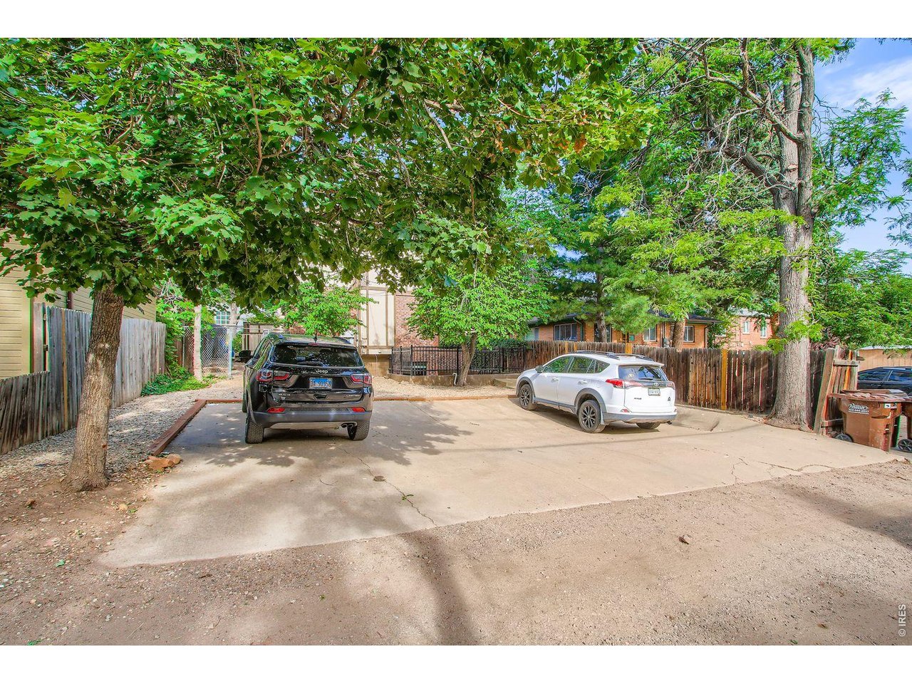 720 17th Street Boulder, CO 80302 - Photo 26 of 35 a view of backyard with a table and chairs