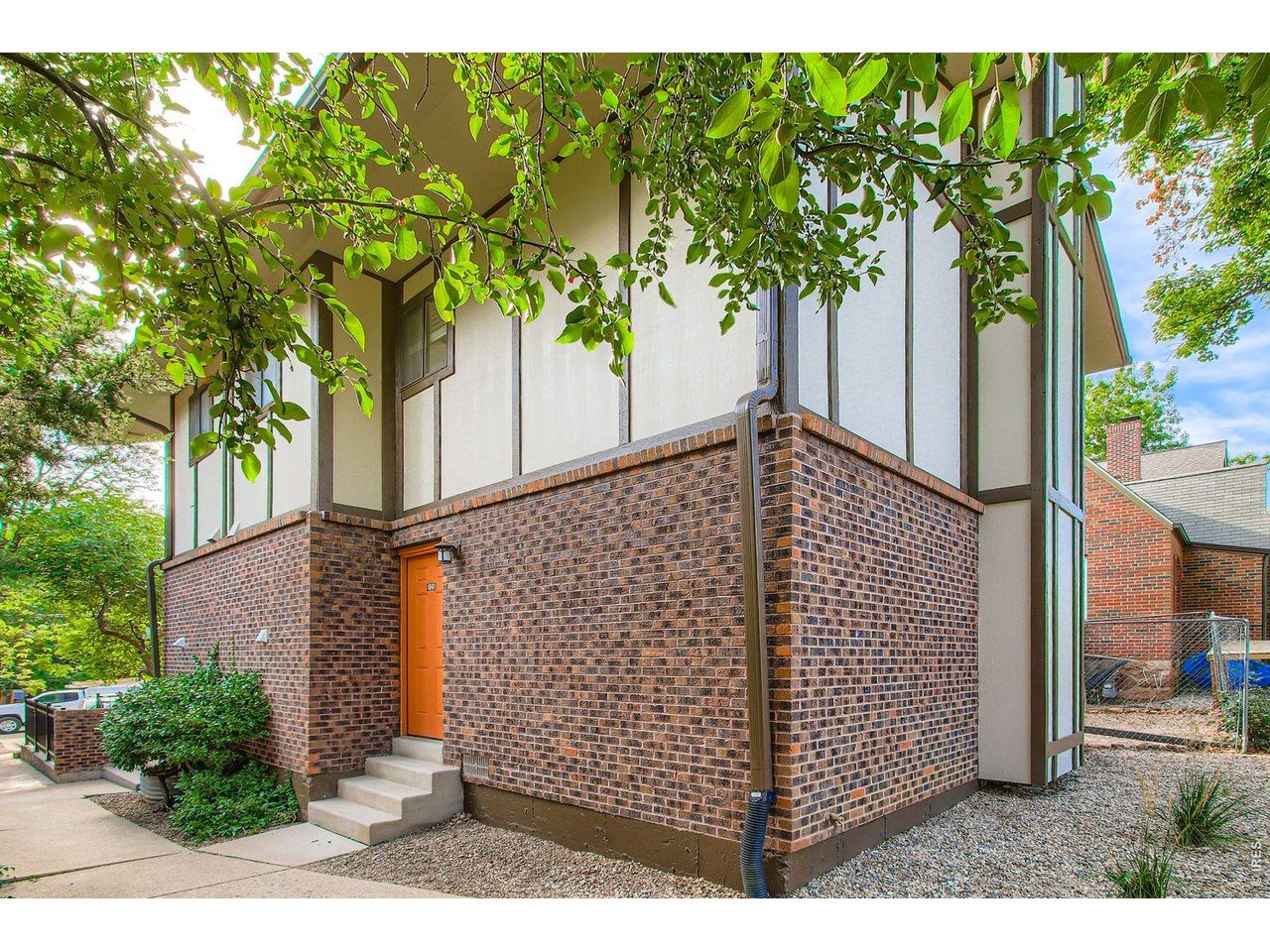 720 17th Street Boulder, CO 80302 - Photo 4 of 35 a view of a house with a tree