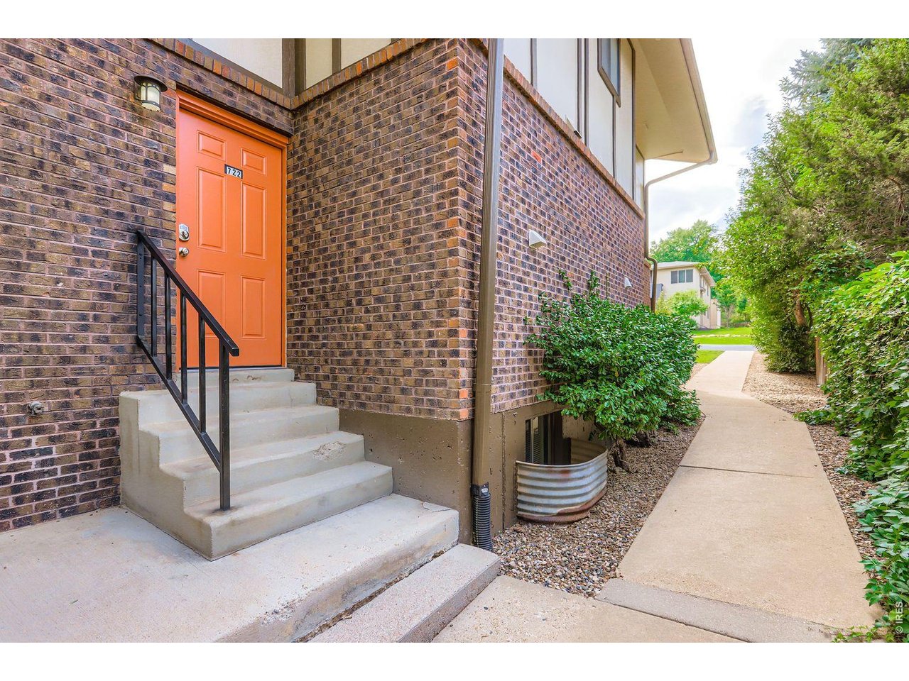 720 17th Street Boulder, CO 80302 - Photo 5 of 35 a view of a patio with furniture and potted plants