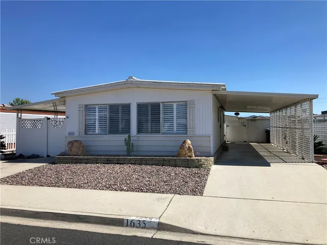 a front view of a house with garage