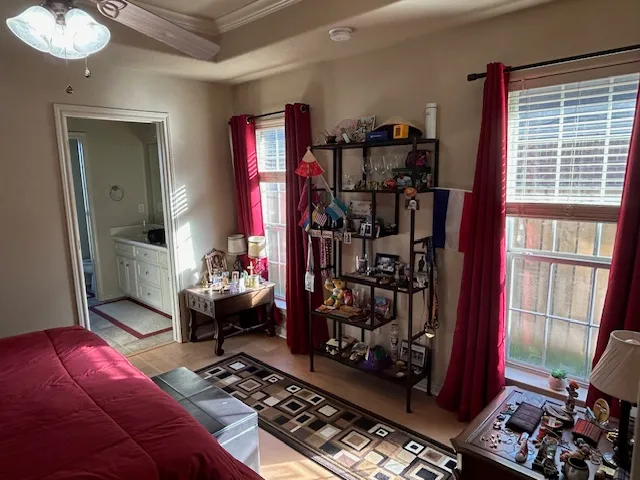 a living room with lots of furniture and a window