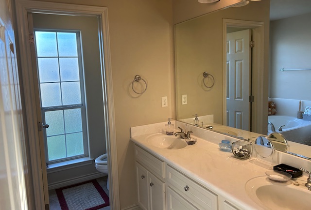 2301 Norham Drive College Station, TX 77845 - Photo 15 of 25 a bathroom with a sink and a mirror