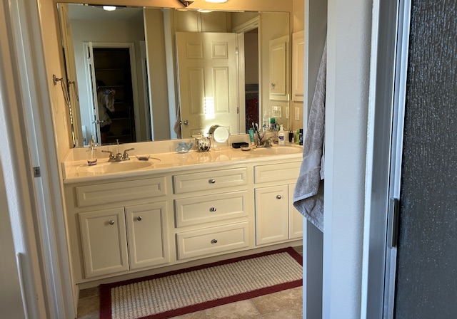 2301 Norham Drive College Station, TX 77845 - Photo 16 of 25 a bathroom with a sink a vanity and a mirror