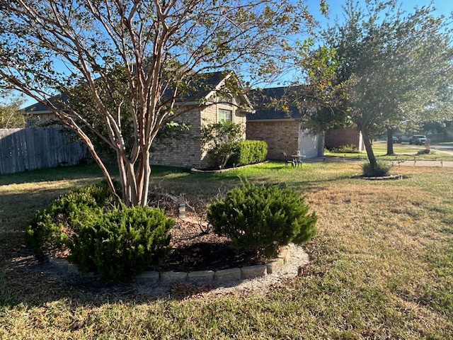 2301 Norham Drive College Station, TX 77845 - Photo 2 of 25 a front view of a house with a yard