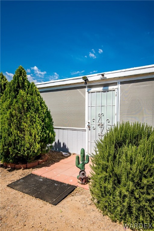 3373 Higley Road Golden Valley, AZ 86413 - Photo 21 of 47 a view of a backyard