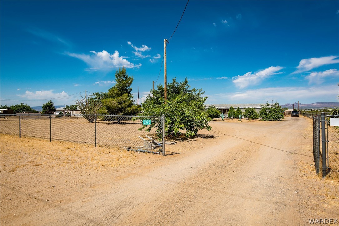 3373 Higley Road Golden Valley, AZ 86413 - Photo 9 of 47 a view of a backyard of a house