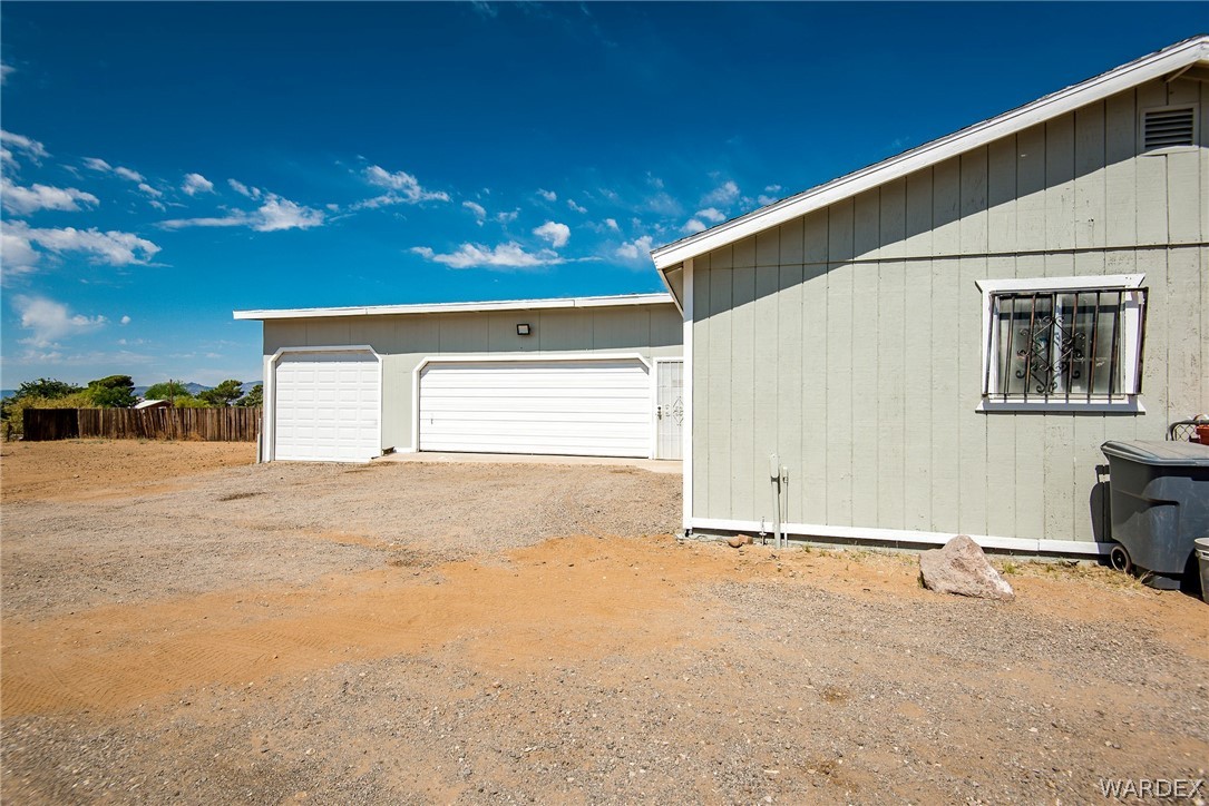 3373 Higley Road Golden Valley, AZ 86413 - Photo 10 of 47 a view of garage with furniture