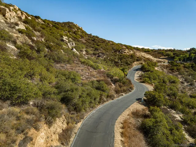 a view of a lake with a yard