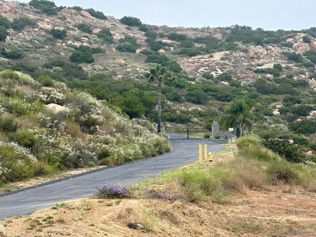a view of a houses with a mountain in the background