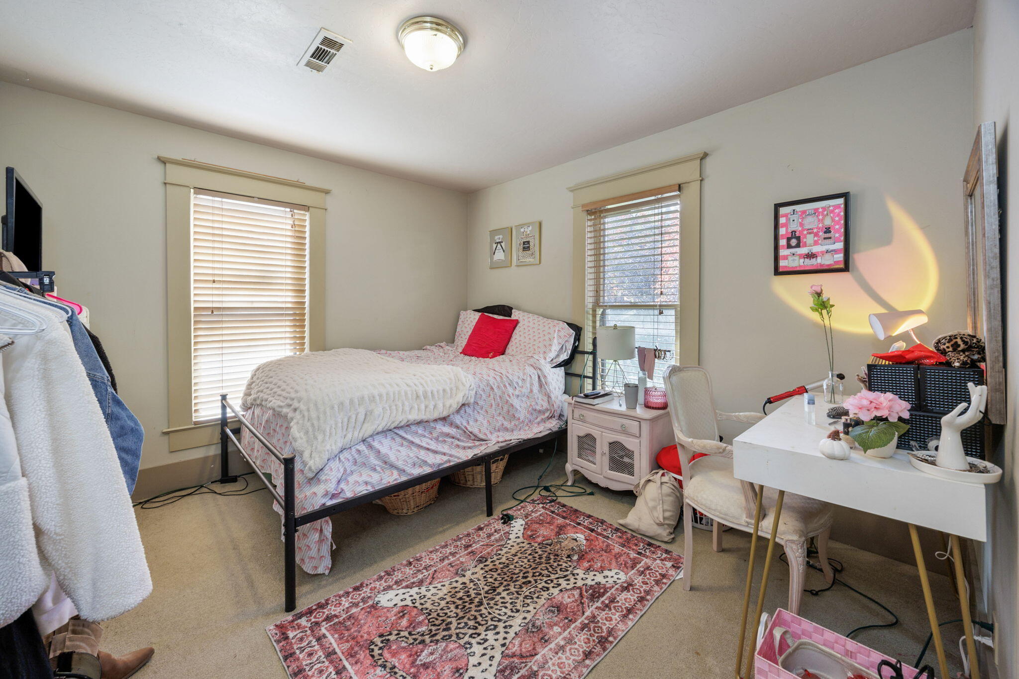 75 Wimer Street Ashland, OR 97520 - Photo 27 of 44 a bedroom with a bed and wooden floor