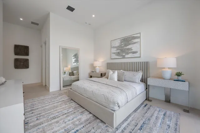 a view of a kitchen with cabinets and wooden floor