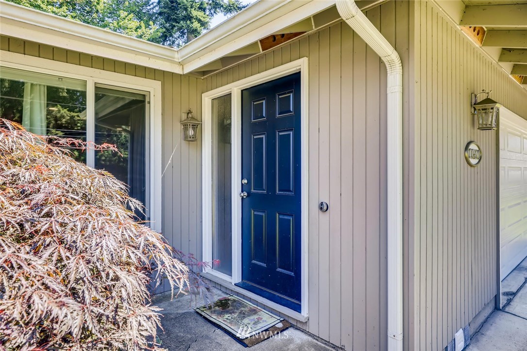 11510 148th Avenue Southeast Renton, WA 98059 - Photo 3 of 37 a front view of a house with a front door