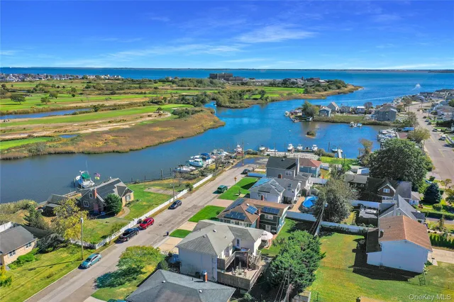 a view of a city with an ocean