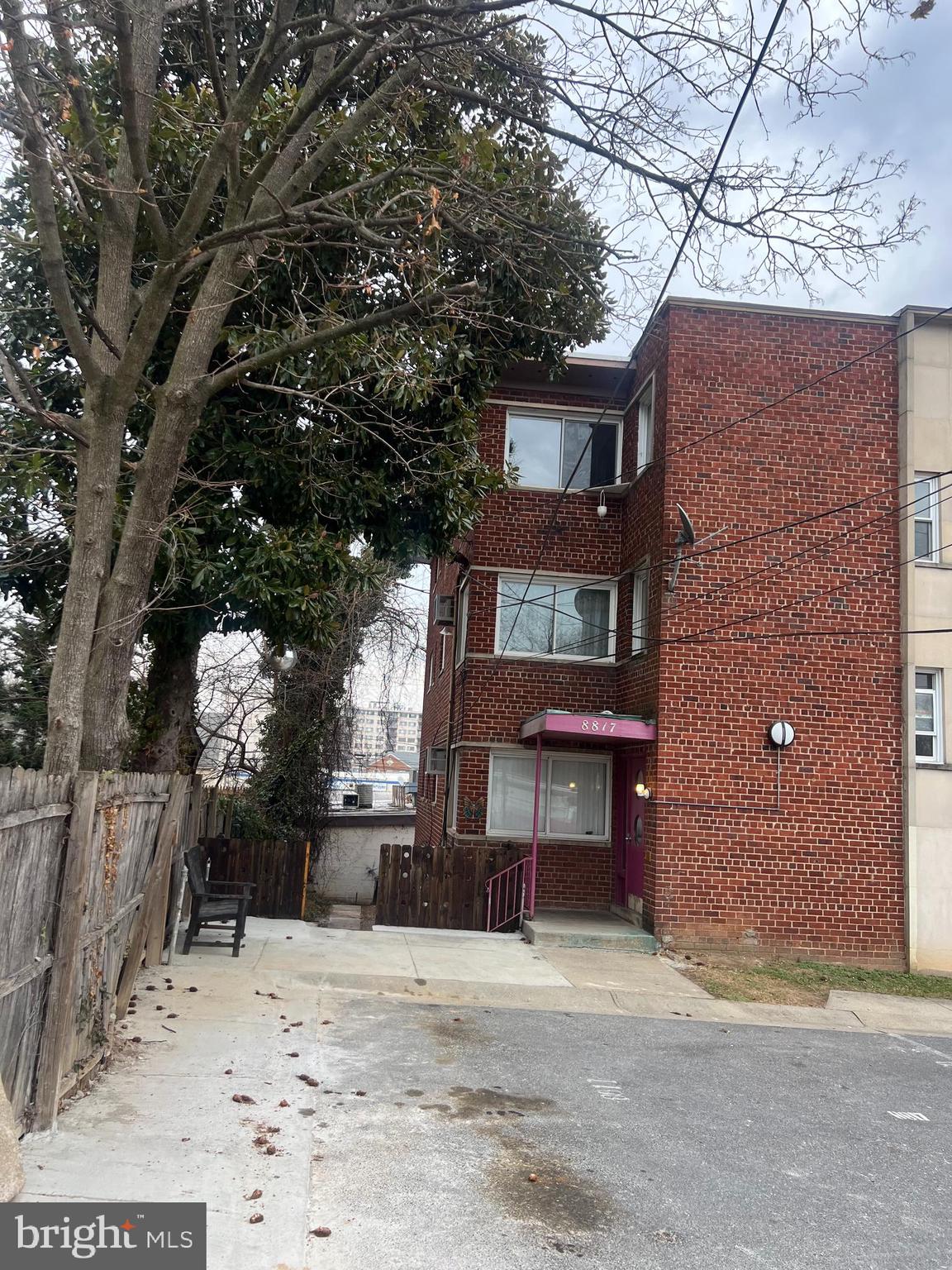8817 Glenville Road Silver Spring, MD 20901 - Photo 3 of 3 a view of a house with a yard and garage