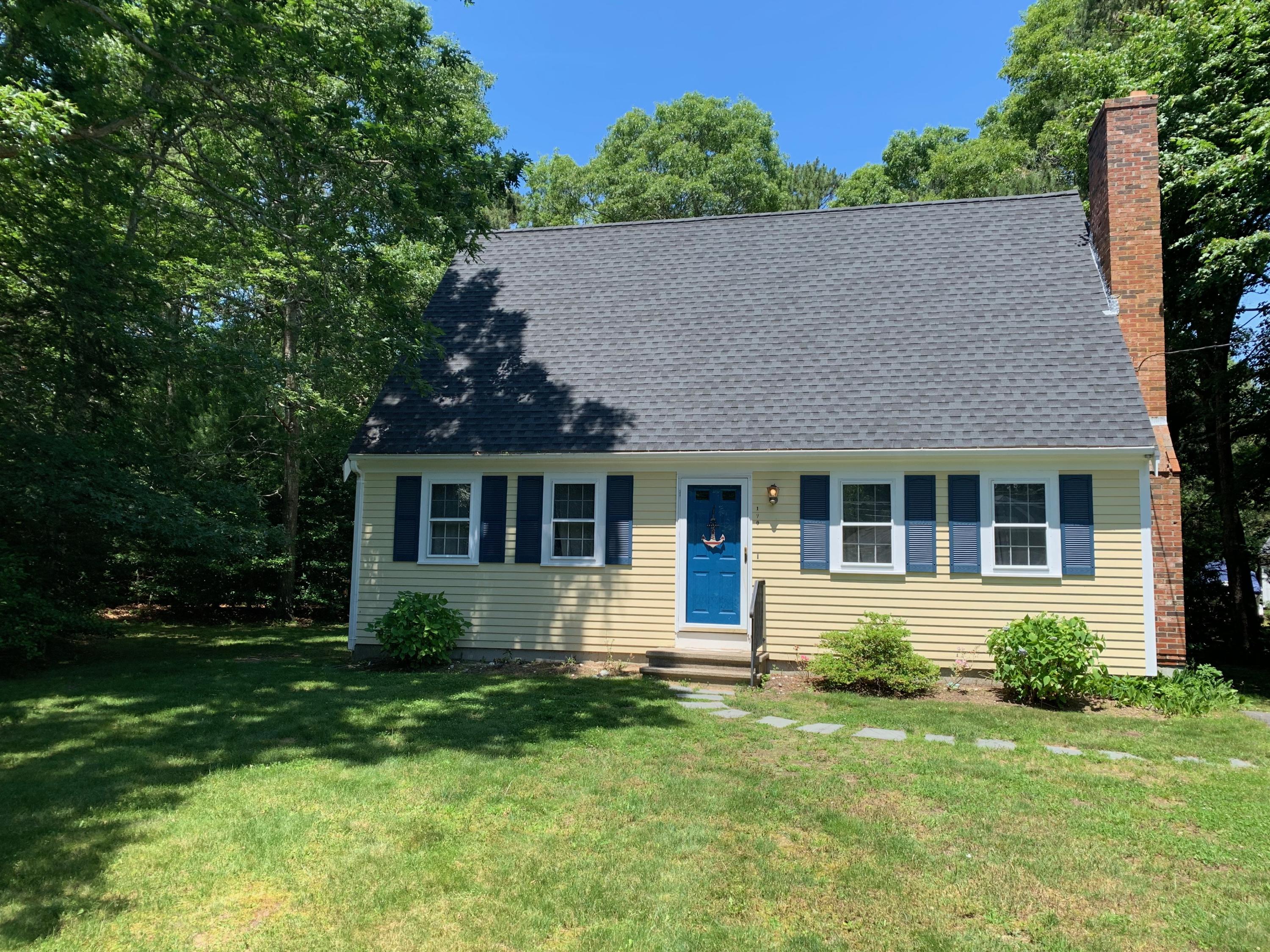 170 Taramac Road Centerville, MA 02632 - Photo 1 of 20 front view of house with a yard