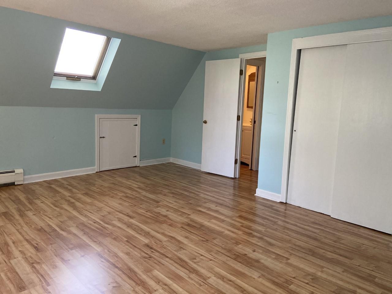 170 Taramac Road Centerville, MA 02632 - Photo 11 of 20 an empty room with wooden floor and closet