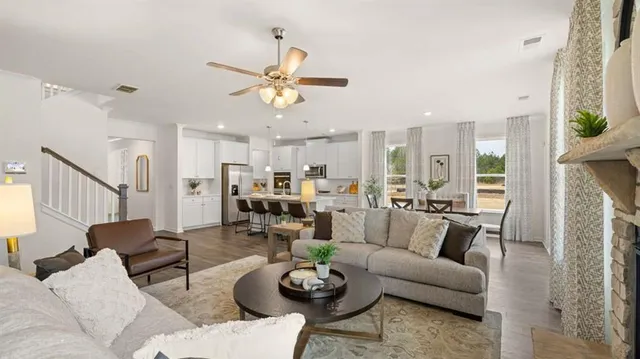 a bedroom with a bed and a mirror