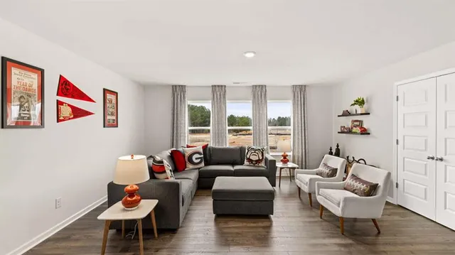 a living room with furniture and a couch