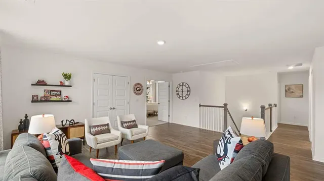 a bedroom with a bed and a table in it