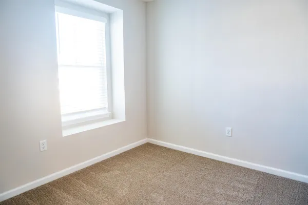 an empty room with a window