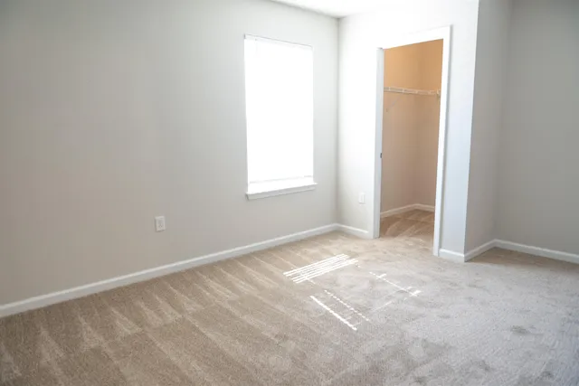 a bathroom with a toilet and a bathtub