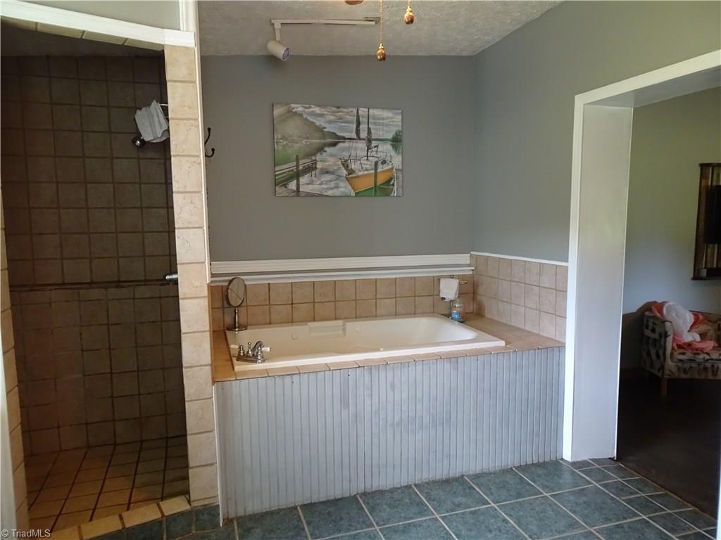 229 Nicholson Road Winston-Salem, NC 27107 - Photo 18 of 22 Master bath has separate shower, jetted tub, dual sinks