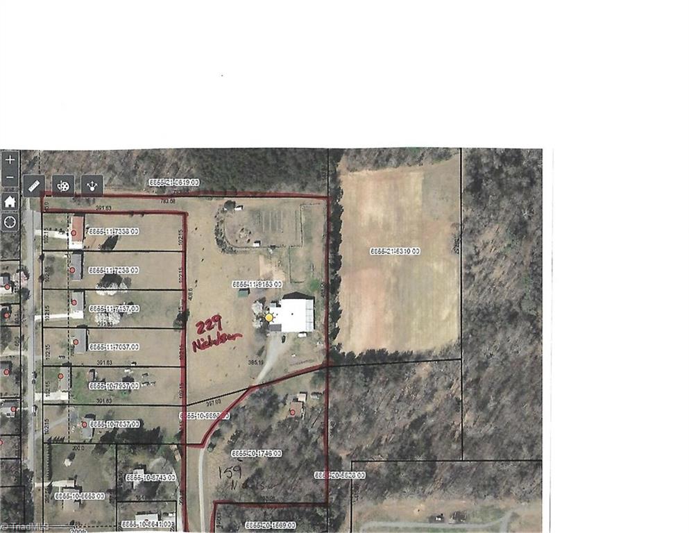 229 Nicholson Road Winston-Salem, NC 27107 - Photo 21 of 22 Just over 5 acres of fenced pasture, riding ring, 7 stall Morton barn with home attached!