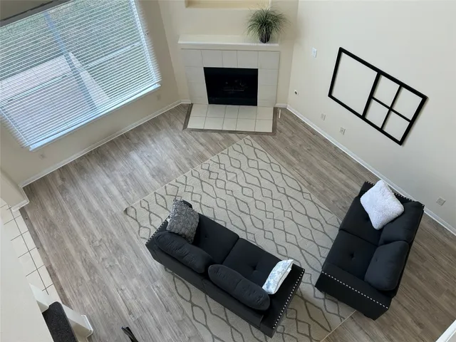 a view of a hardwood floor and a sink in a room