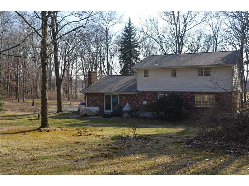 280 McKenzie Road Clinton, PA 15026 - Photo 2 of 16 Exterior Back. GREAT HOME & YARD. PRIVATE SETTING. SLIDING DOOR FROM FAM.ROOM TO PATIO. 2012 NEW ROOF.MATURE TREES IN YARD.