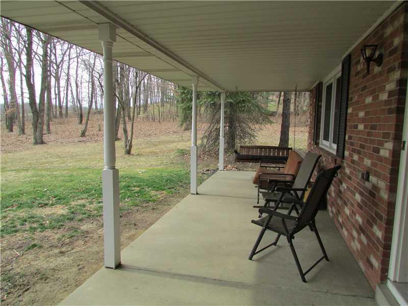 280 McKenzie Road Clinton, PA 15026 - Photo 3 of 16 Patio/Deck. FRONT COVERED PORCH.
