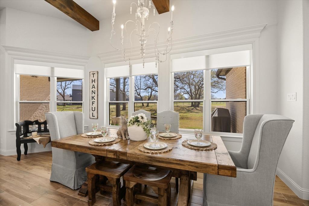 1700 Knox Road Tolar, TX 76476 - Photo 13 of 39 a view of a dining room with furniture window and wooden floor