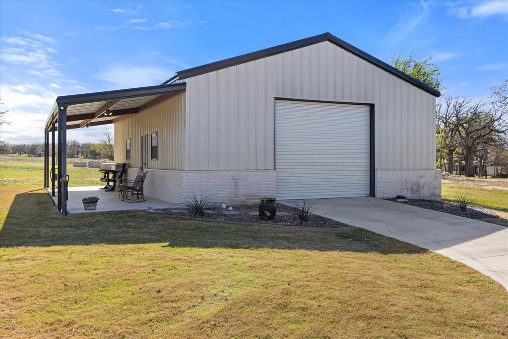 1700 Knox Road Tolar, TX 76476 - Photo 31 of 39 a view of a house with pool and sitting area