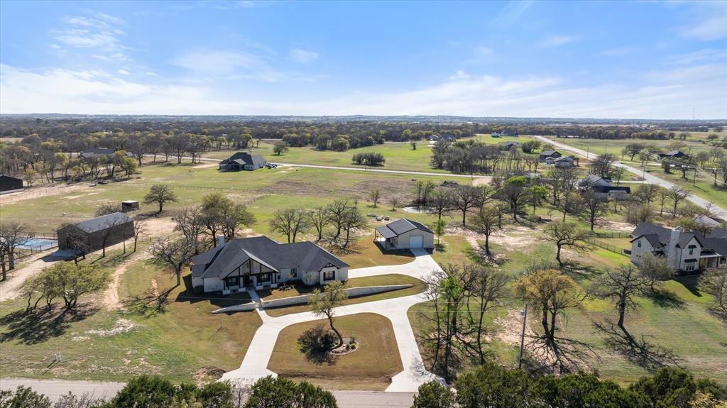 1700 Knox Road Tolar, TX 76476 - Photo 37 of 39 an aerial view of a house with a lake view