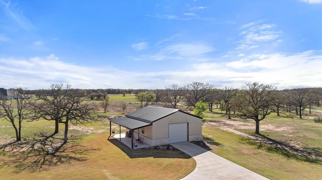 1700 Knox Road Tolar, TX 76476 - Photo 38 of 39 a view of a lake with a mountain