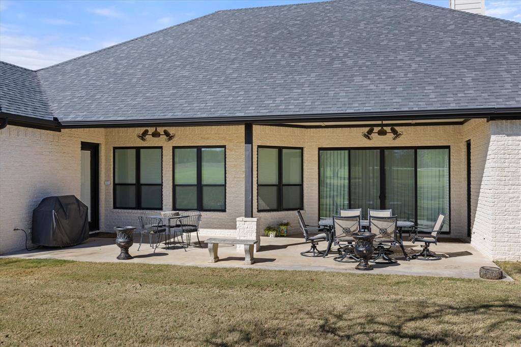 1700 Knox Road Tolar, TX 76476 - Photo 39 of 39 a view of a chairs and table in patio